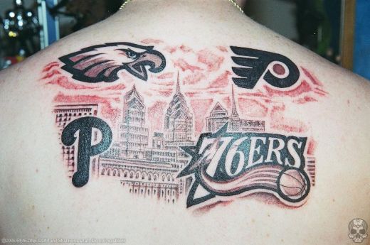 Players Sports Tattoo On Upper Back