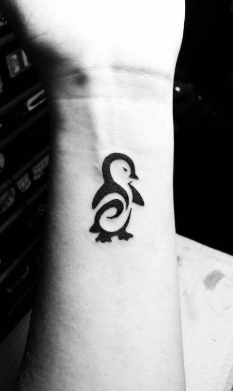 Tribal Penguin Tattoo On Wrist