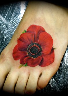 Beautiful Poppy Tattoo Design On Left Foot