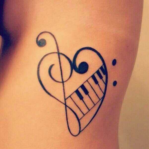 Cute Music Tattoo On Rib Cage