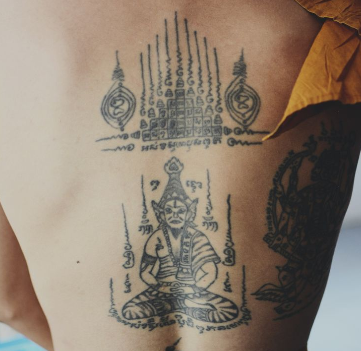 Grey Buddhist Tattoo On Back Body