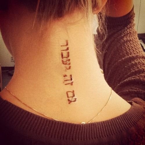 Hebrew Tattoo On Girl Nape