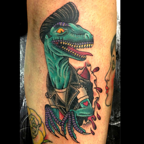 Ripped Skin Color Dinosaur Tattoo