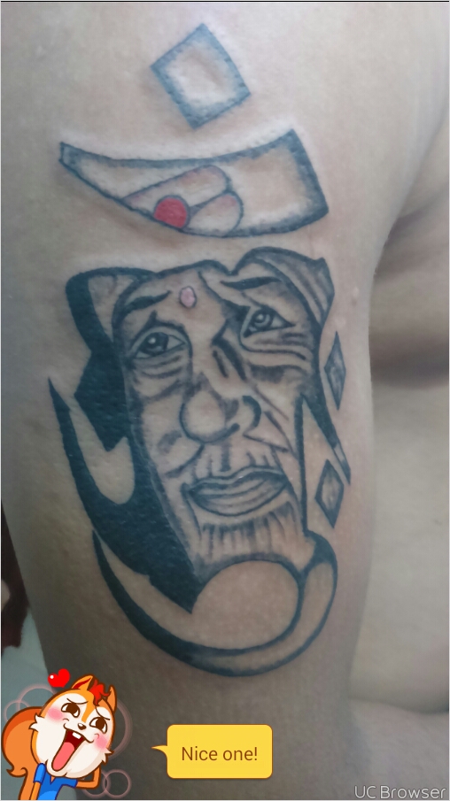 Sai Baba Lord Ganesha In Om Religious Tattoo