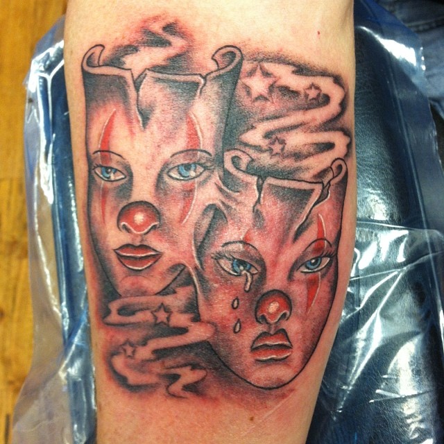 Clown Masks Tattoos On Bicep