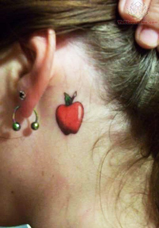 Cute Small Red Apple Tattoo Behind Ear by Ana Maranges Hackman
