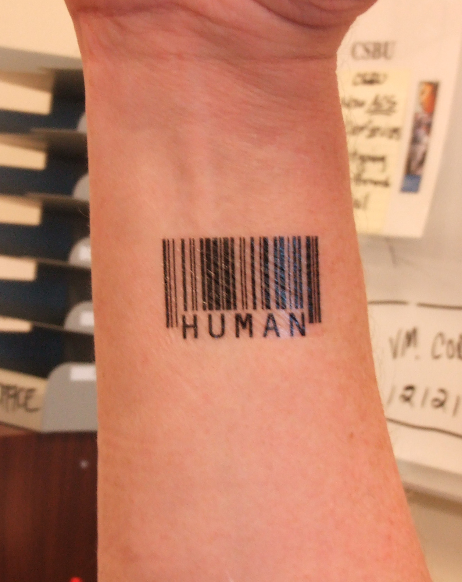 Human Barcode Tattoo On Forearm by Scott Blake