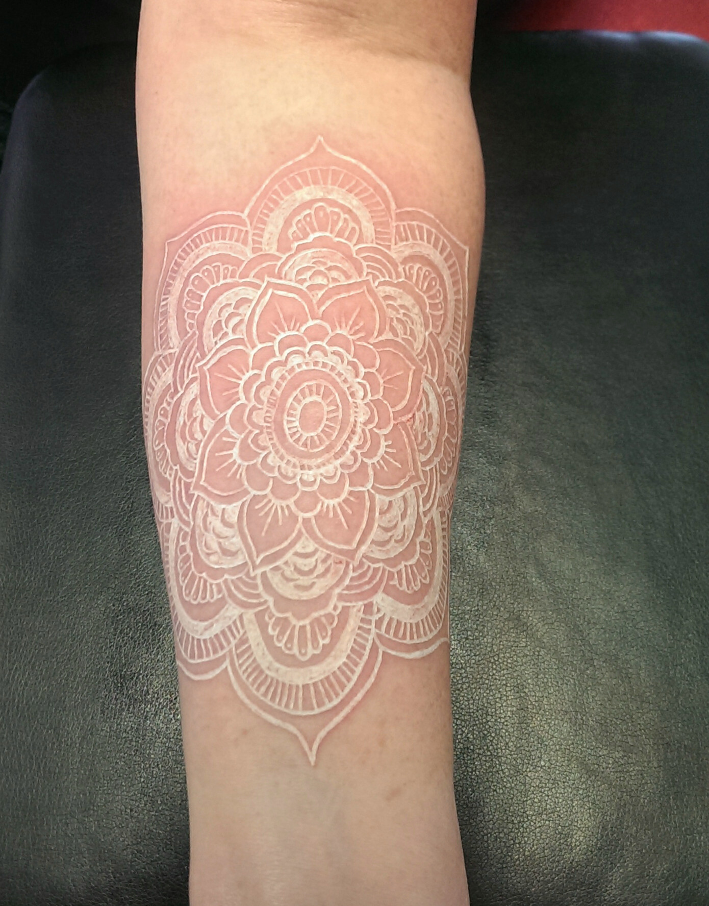 Mandala Flower White Ink Tattoo On Left Forearm