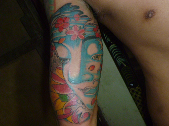 Color Ink Buddhist Tattoo On Half Sleeve