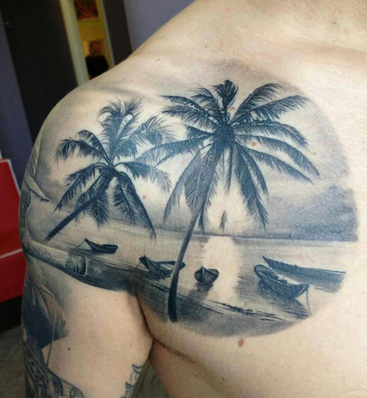 Black And Grey Beach Tattoo On Front Shoulder
