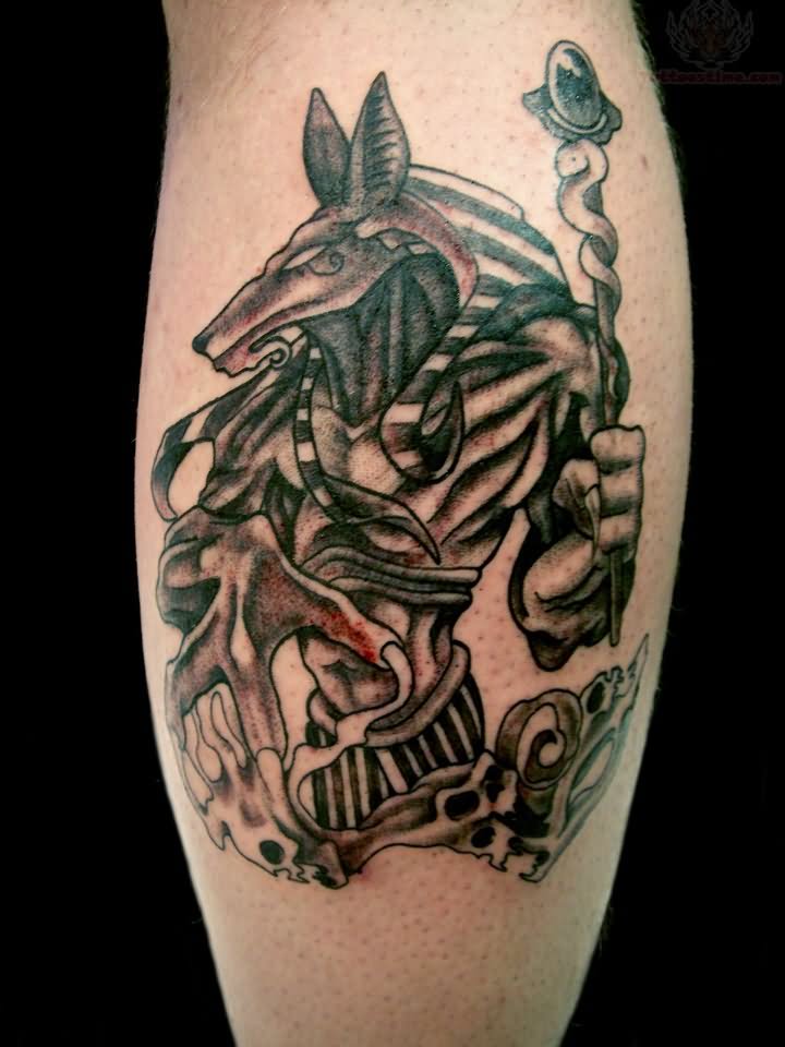Grey Ink Egyptian God Anubis Tattoo On Leg