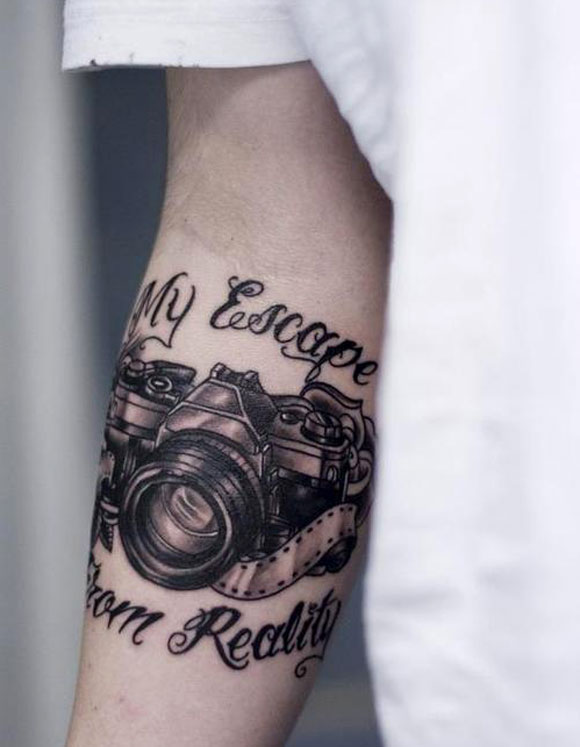 My Escape From Reality Camera Tattoo On Right Forearm