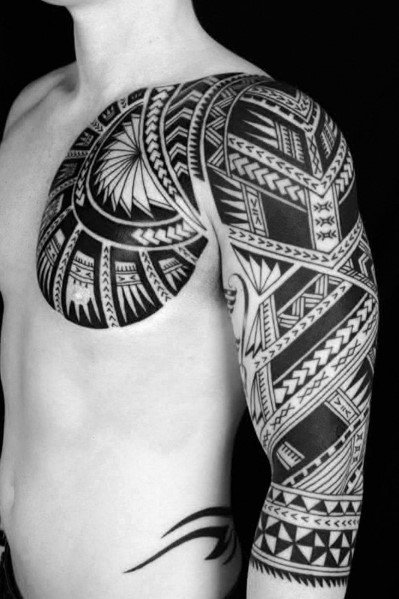 Polynesian Tattoo On Man Chest And Left Arm