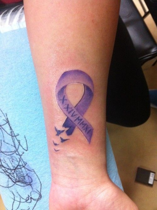 Purple Cancer Ribbon Tattoo On Left Forearm