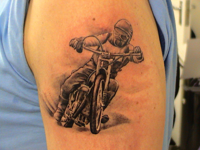 Realistic Bike Rider Tattoo On Left Shoulder
