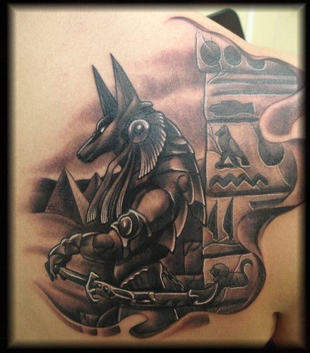 Realistic Grey Anubis Tattoo On Right Back Shoulder
