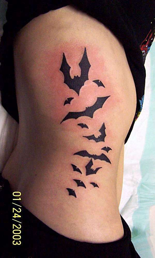 Side Rib Flying Bat Tattoos
