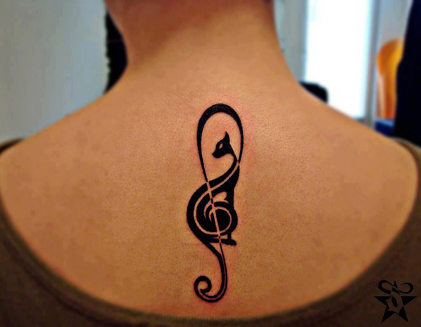 Nice Cat Music Tattoo On Upper Back For Woman