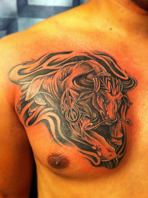 Wonderful Tribal Agressive Bull Tattoo On Chest