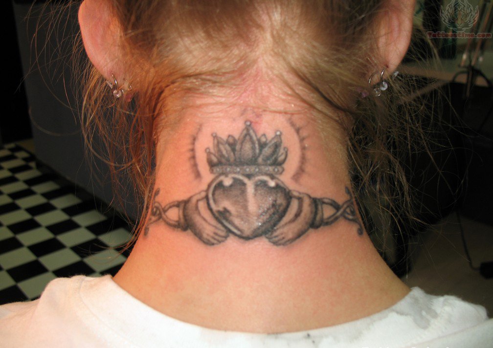 Grey Ink Claddagh Tattoo On Nape
