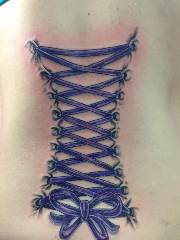Purple Ink Corset Tattoo On Back