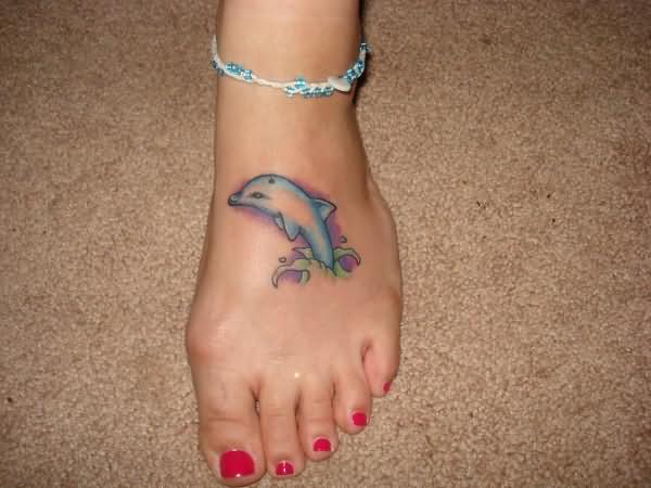 Beautiful Dolphin Tattoo On Girl Left Foot