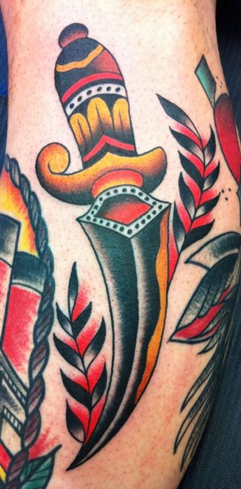 Colored Traditional Dagger Tattoo On Sleeve