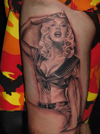 Realistic Grey Ink Pinup Girl Tattoo On Side Leg