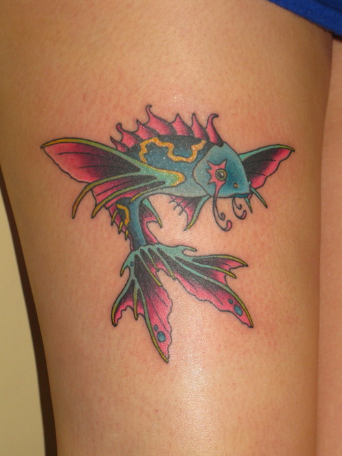 Small Crap Fish Tattoo On Thigh
