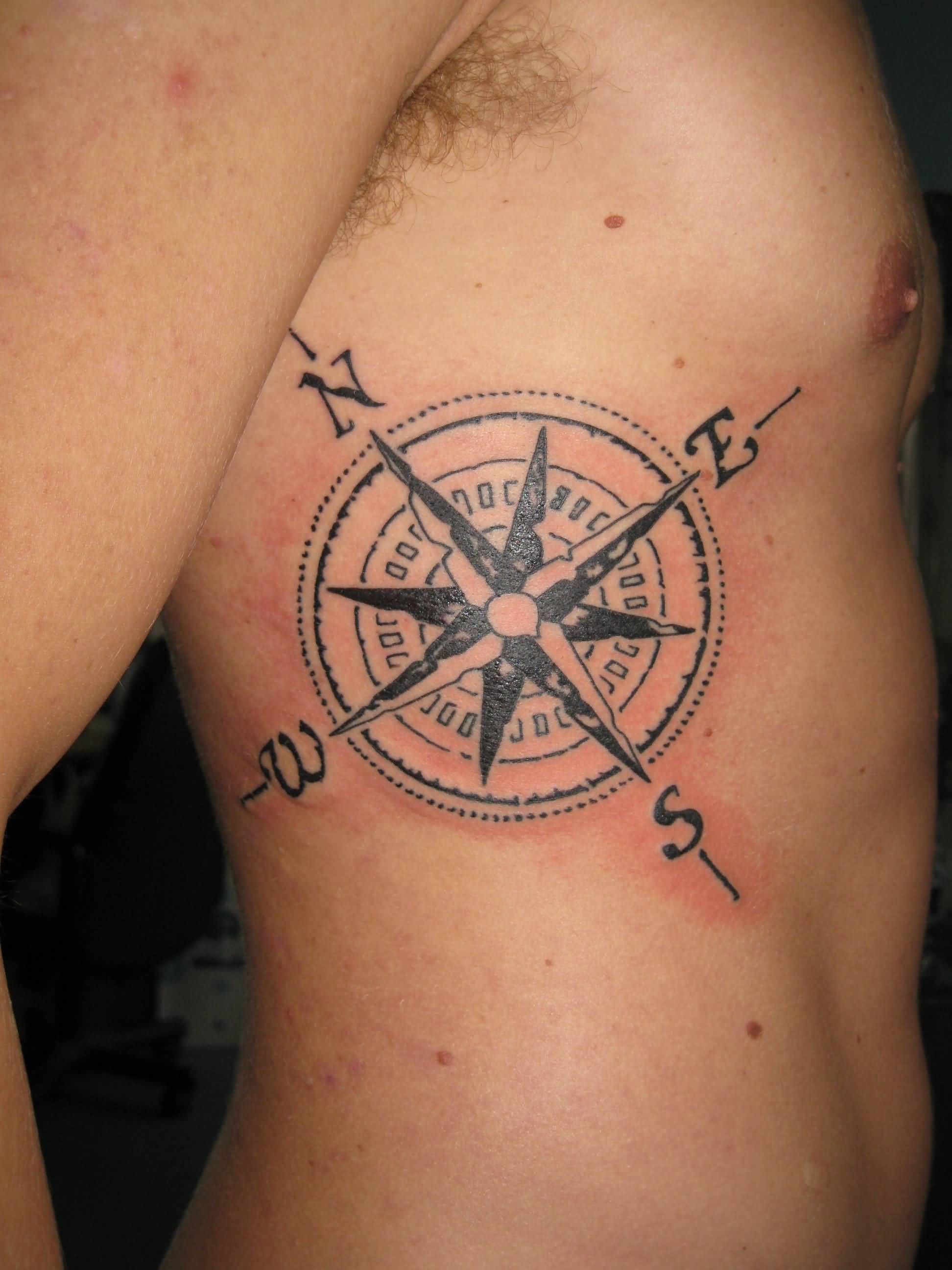 Man Side Rib Compass Tattoo Idea