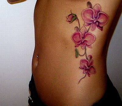 Pink Orchid Tattoos On Side Rib
