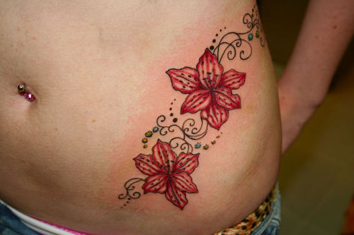 Red Orchid Tattoos On Left Hip