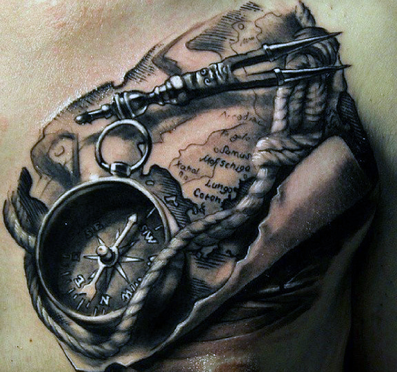 Rope And Compass Tattoo On Man Chest