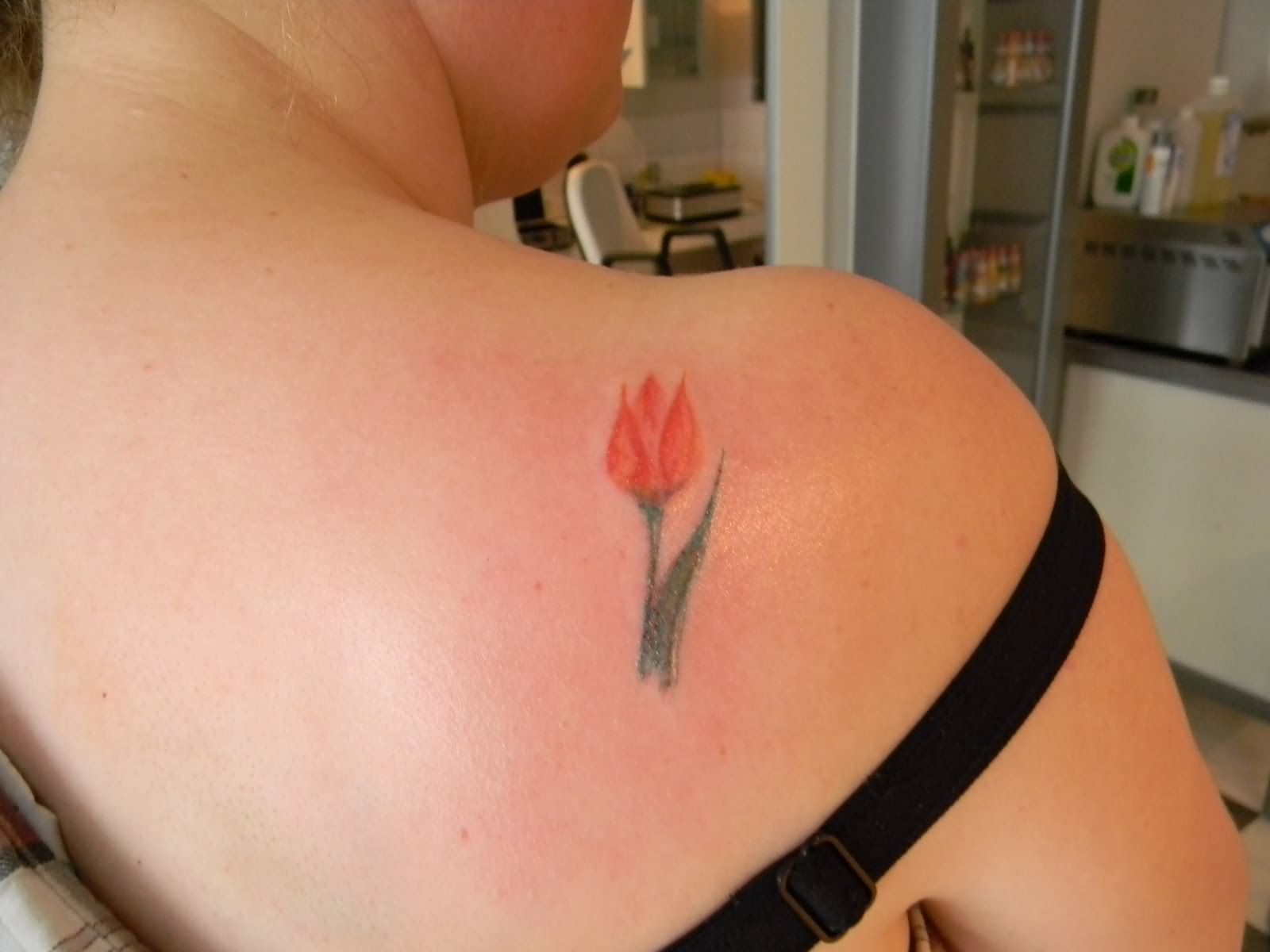 Small Tulip Tattoo On Right Back Shoulder