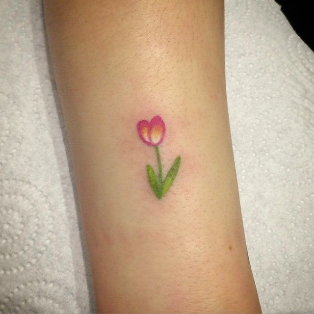 Tiny Pink Tulip Tattoo On Arm
