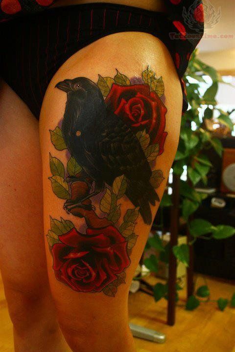 Two red Roses And Crow Tattoo On Thigh