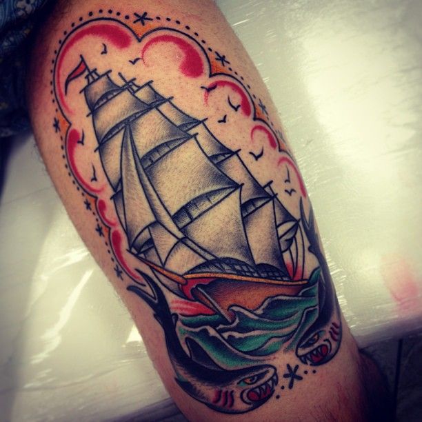 Colored Sailor Ship Tattoo On Thigh
