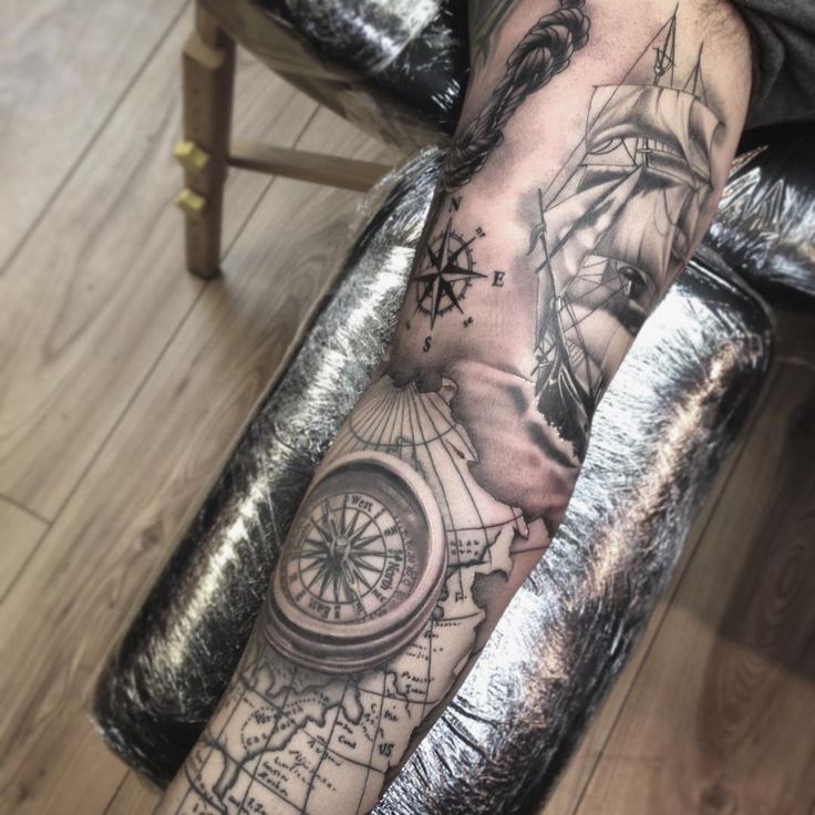 Grey Ink Compass And Ship Tattoo On Full Sleeve