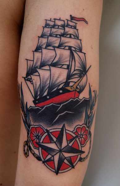 Traditional Star And Ship Tattoo On Arm Sleeve