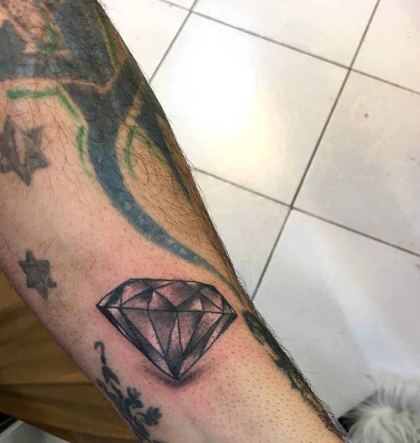 Realistic Grey Diamond Tattoo On Left Forearm
