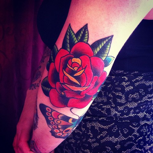 Rose Flower Tattoo On Left Elbow