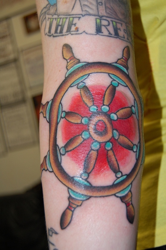 Sailor Wheel Tattoo On Elbow
