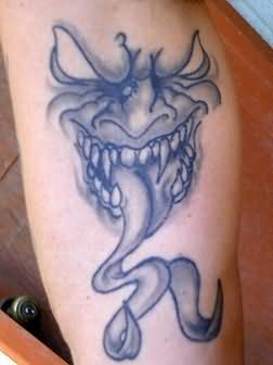 Gargoyle Tattoo On Muscle