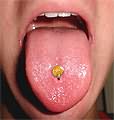 Tiny Tongue Tattoo